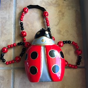 Timmy Woods hand-carved “Ladybug” wooden purse
